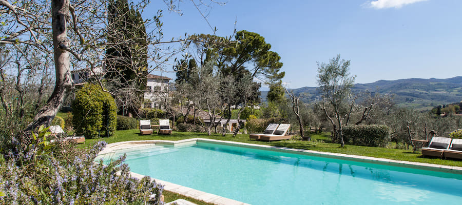 Hotel Villa Bordoni pool with olive trees and Chianti hills panorama